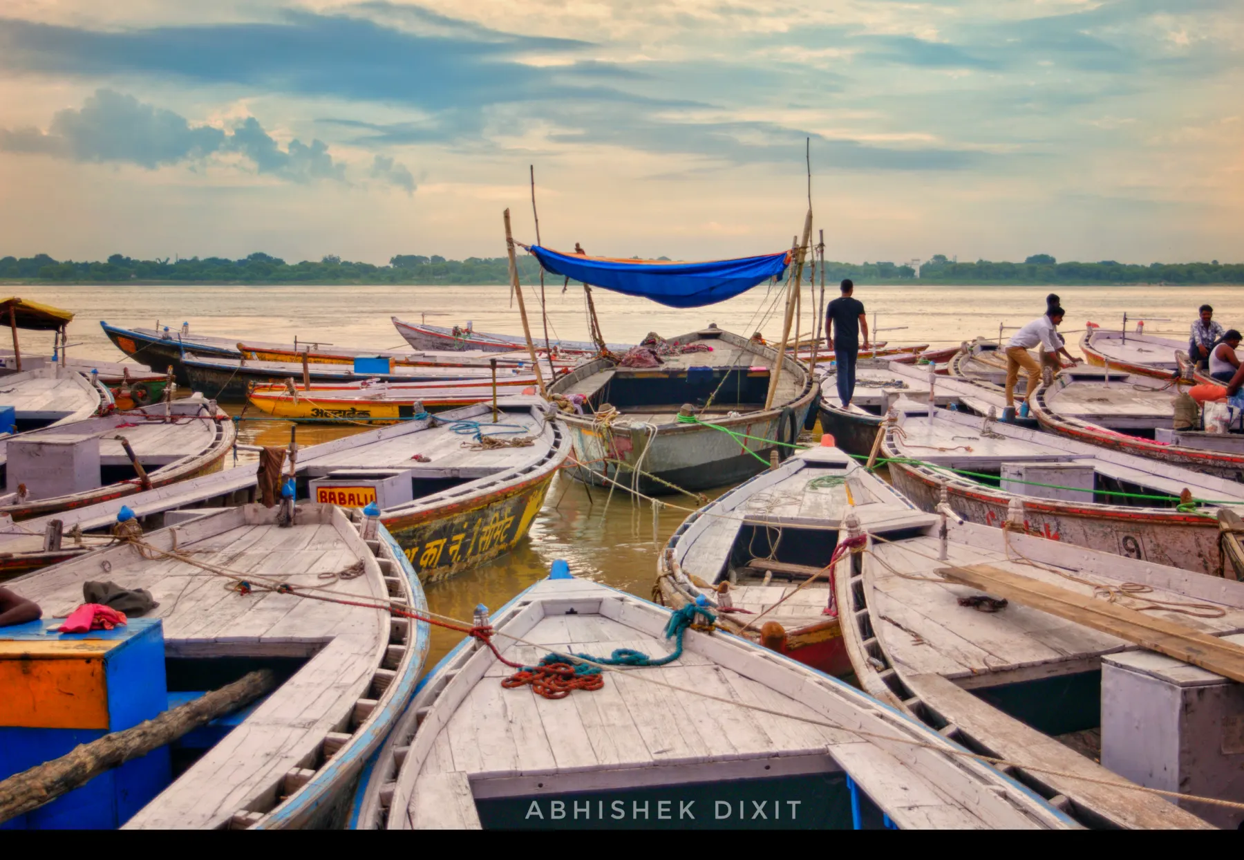 Wooden boats moored on the Ganga in soft morning light